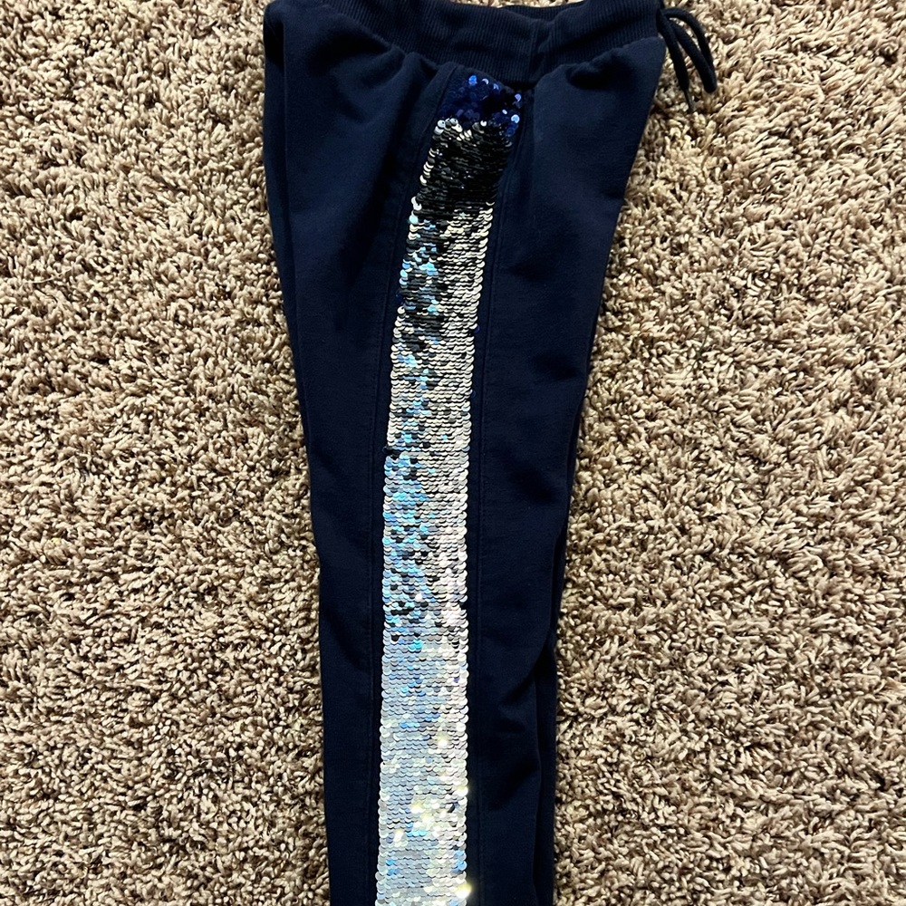 Girls flip sequence tapered ankle sweat pants.